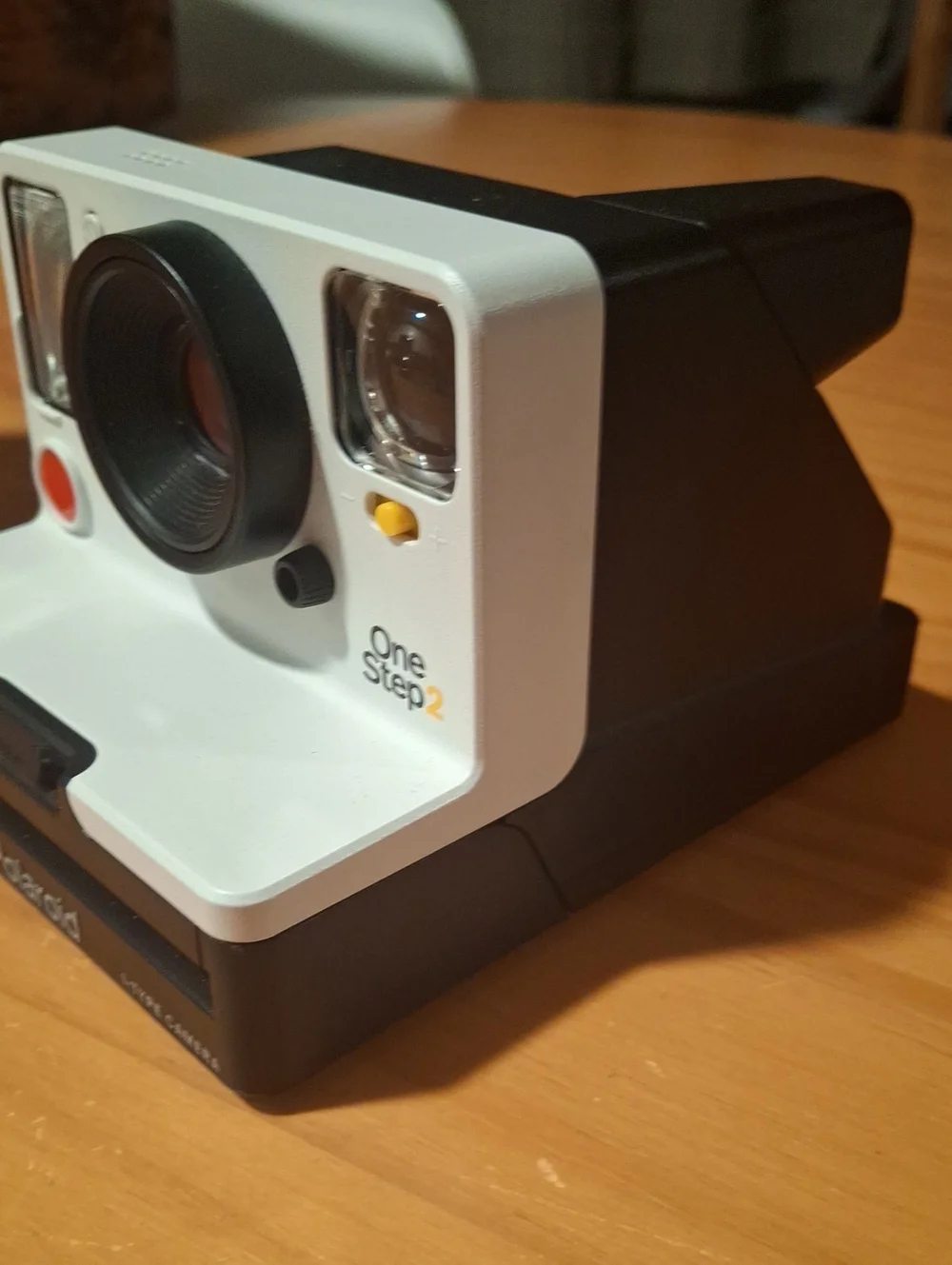 Polaroid OneStep2 Instant Camera in White with Black and Red Accents